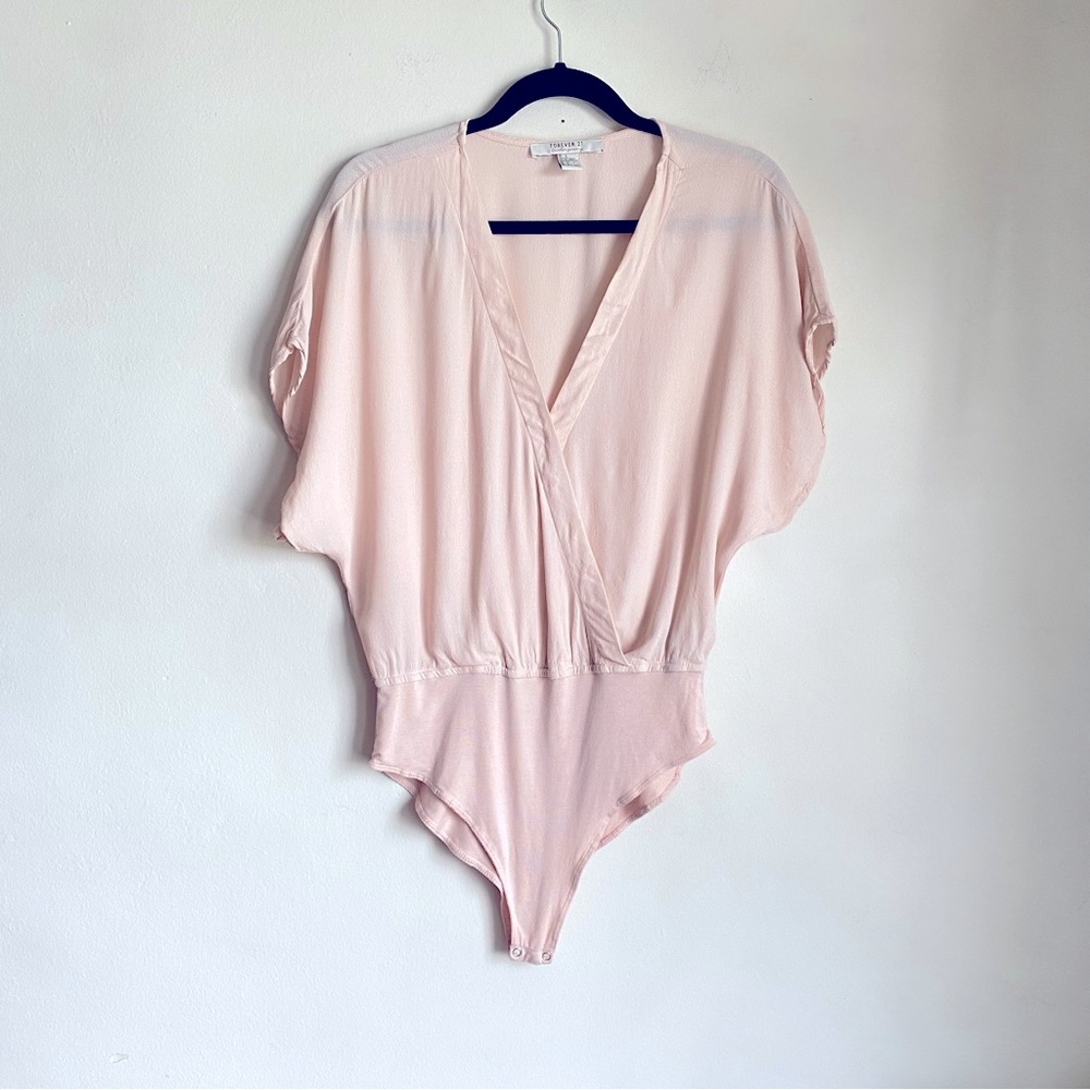 Peach flowy short sleeve bodysuit. Size large